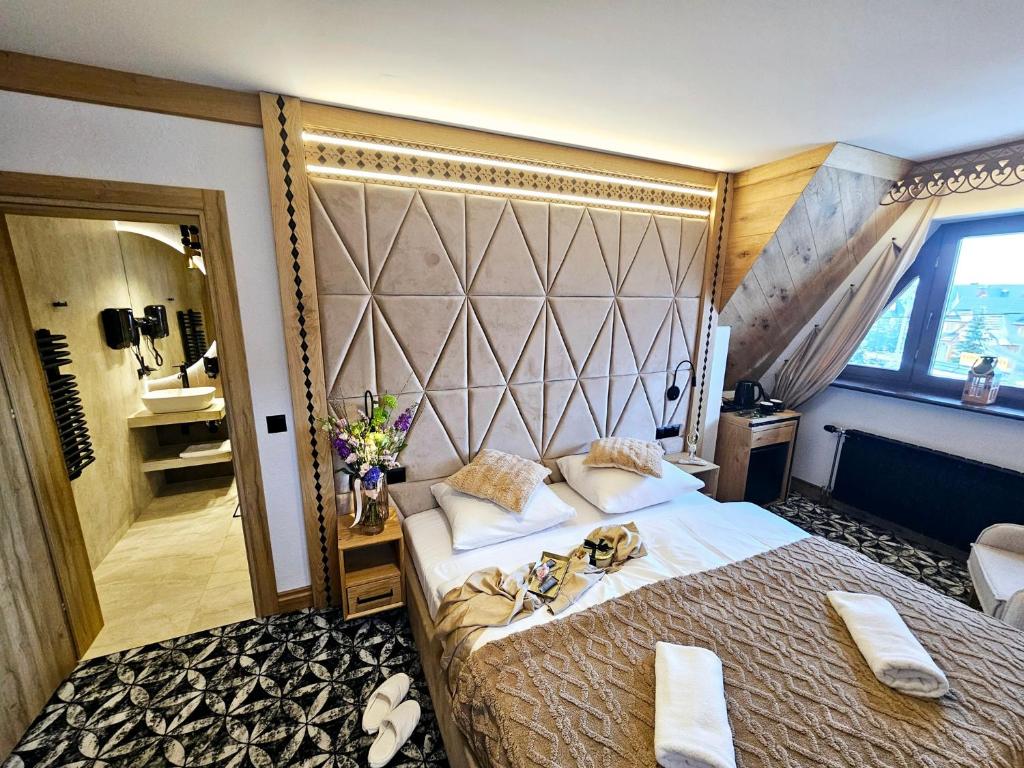 Posteľ alebo postele v izbe v ubytovaní Willa Regina I Resort & SPA