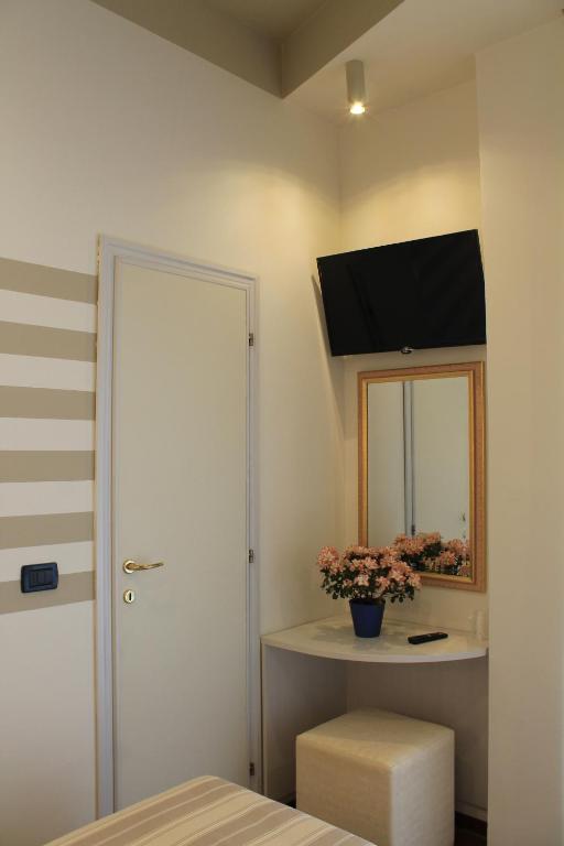 TV a/nebo společenská místnost v ubytování Hotel Piccinelli