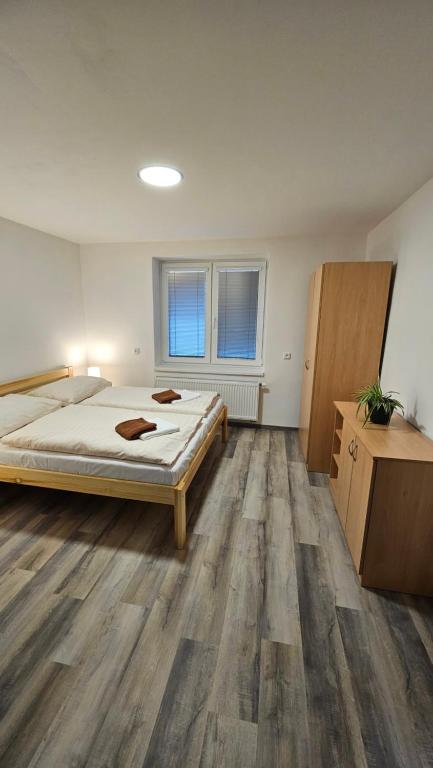 Postel nebo postele na pokoji v ubytování Apartmány U Provazníka