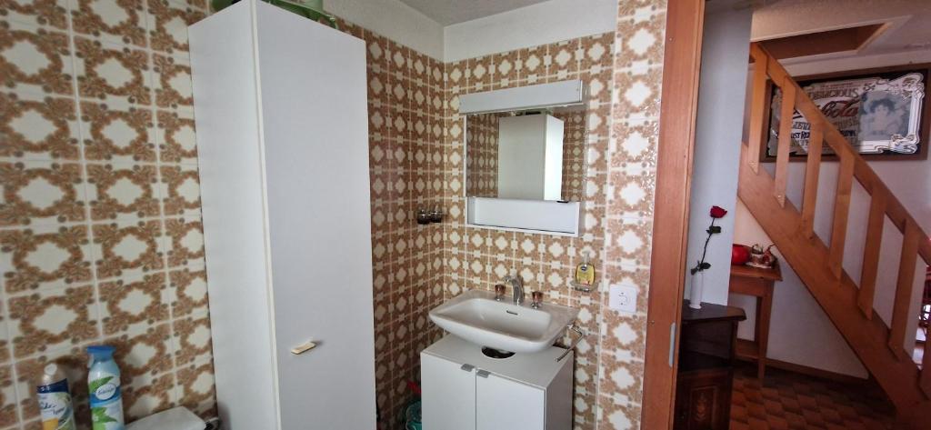 Koupelna v ubytování Appartement, vue sur le lac