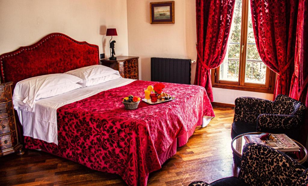 Postel nebo postele na pokoji v ubytování Hotel La Calcina