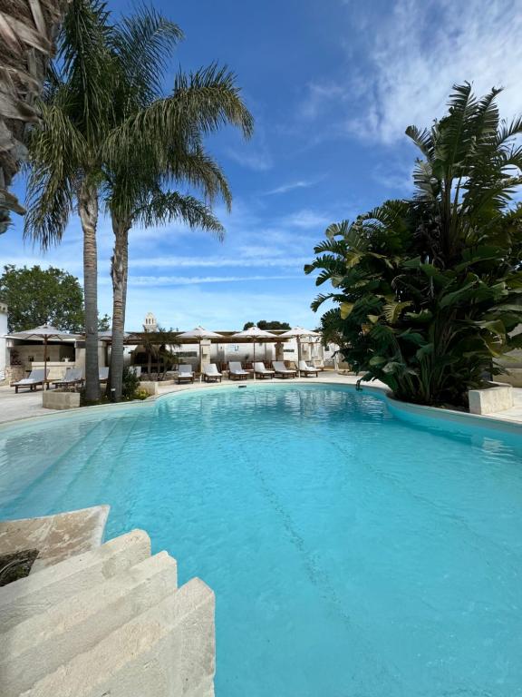 Bazén v ubytování Masseria Messapia Wine Resort & Spa Salento nebo v jeho okolí