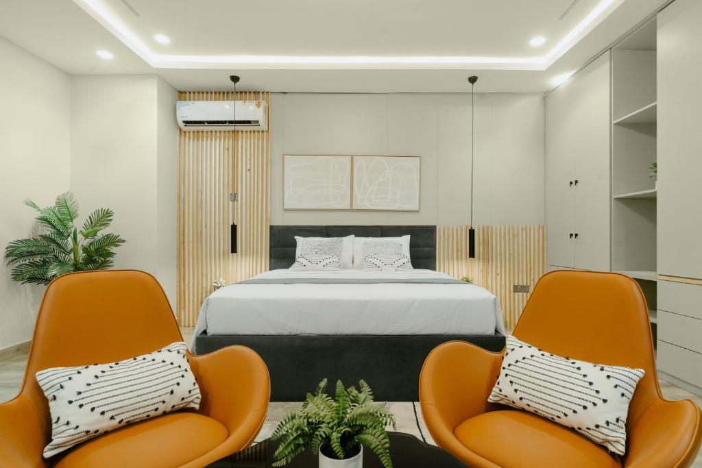 Postel nebo postele na pokoji v ubytování Kashco Apartments Wuse 2 Abuja