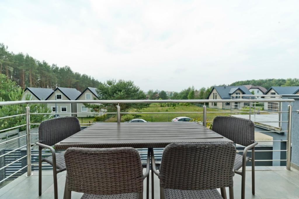 Balkón alebo terasa v ubytovaní Resort EDEN domki, apartamenty i pokoje