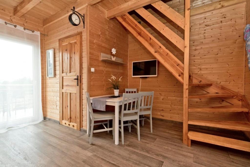 Televízia a/alebo spoločenská miestnosť v ubytovaní Resort EDEN domki, apartamenty i pokoje