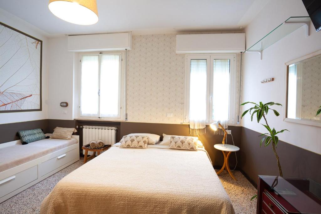 Postel nebo postele na pokoji v ubytování B&B La Volpina