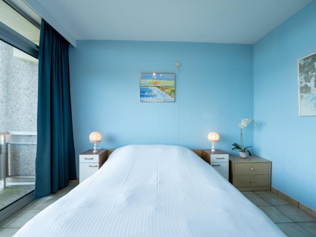 Postel nebo postele na pokoji v ubytování Apartment Ref- 801 by Interhome