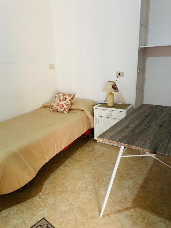 Posteľ alebo postele v izbe v ubytovaní Casa vacanza Giusi