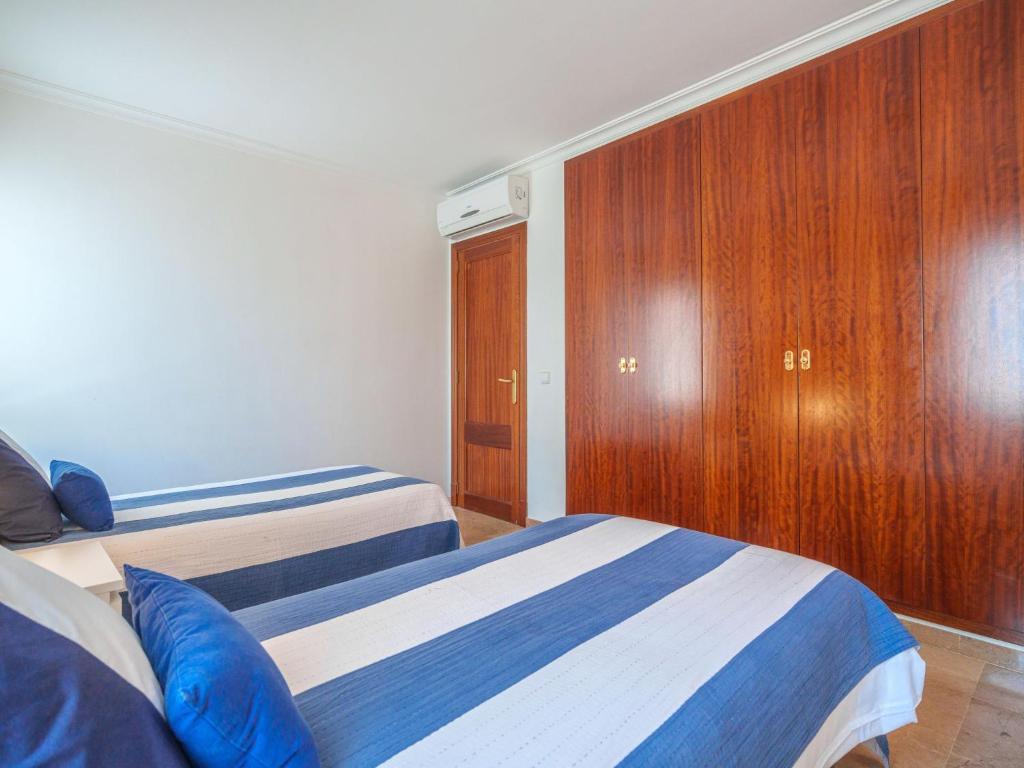 Posteľ alebo postele v izbe v ubytovaní Apartment Maritimo by Interhome