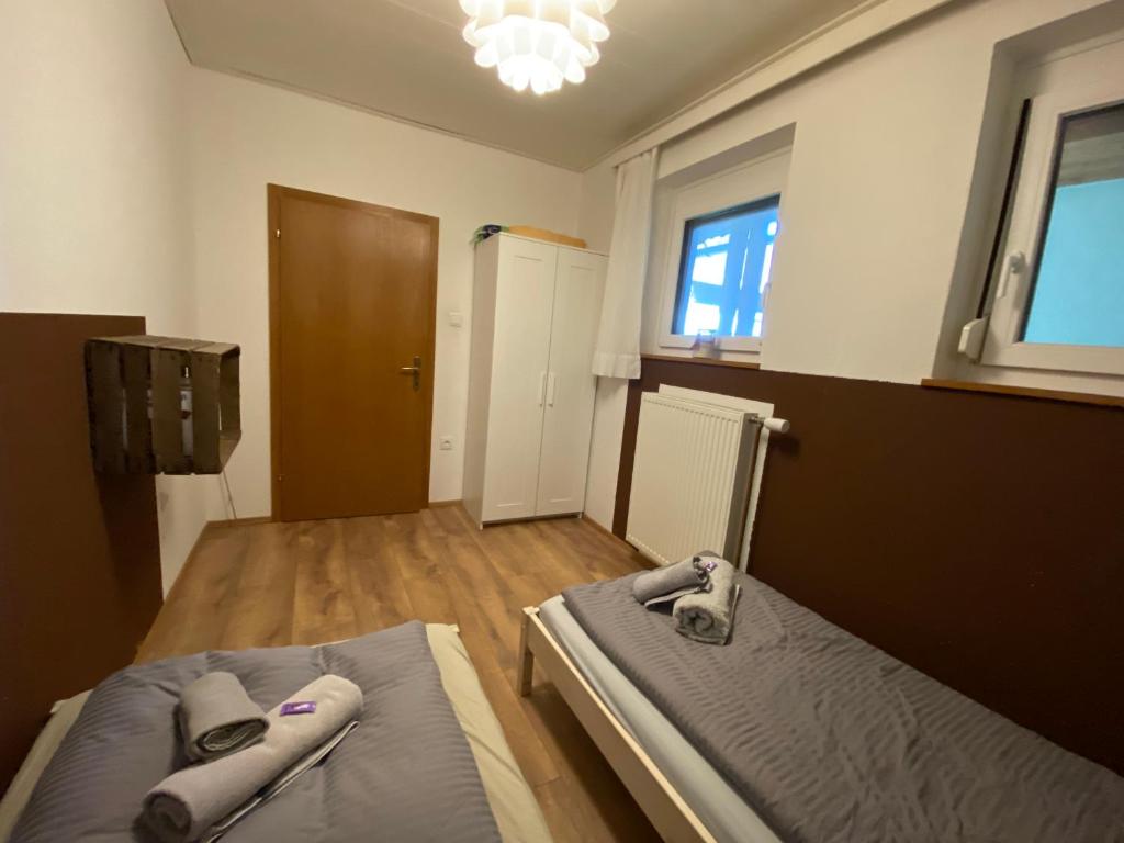 Postel nebo postele na pokoji v ubytování Seewohnung Weiss