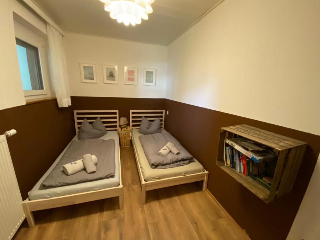 Postel nebo postele na pokoji v ubytování Seewohnung Weiss