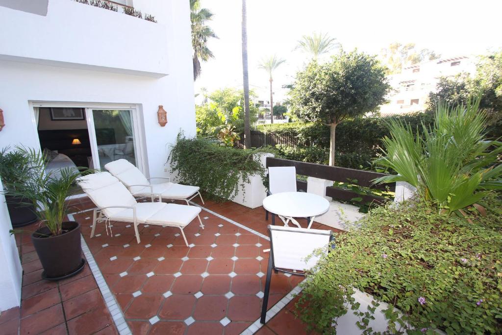 A garden outside 1126 BEACHFRONT HIGH STANDARD APARTMENT WITH TERRACE