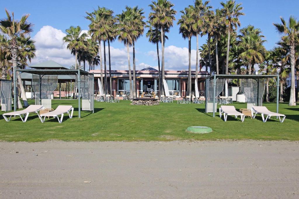 A garden outside 1126 BEACHFRONT HIGH STANDARD APARTMENT WITH TERRACE