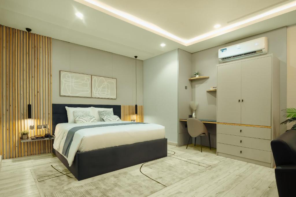 Postel nebo postele na pokoji v ubytování Kashco Apartments Wuse 2 Abuja
