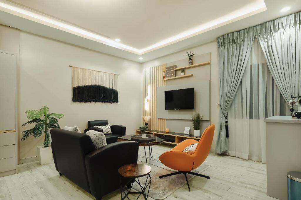 TV a/nebo společenská místnost v ubytování Kashco Apartments Wuse 2 Abuja