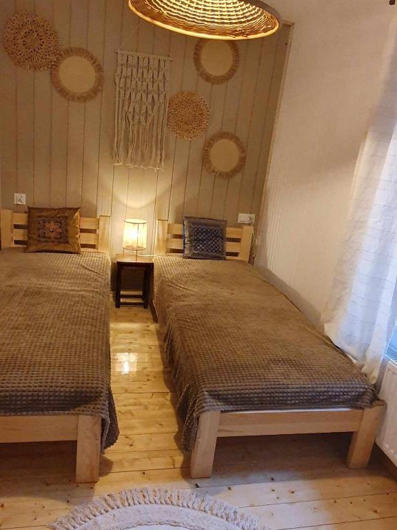 Posteľ alebo postele v izbe v ubytovaní Dom na Warmii -Siedlisko Mozaika