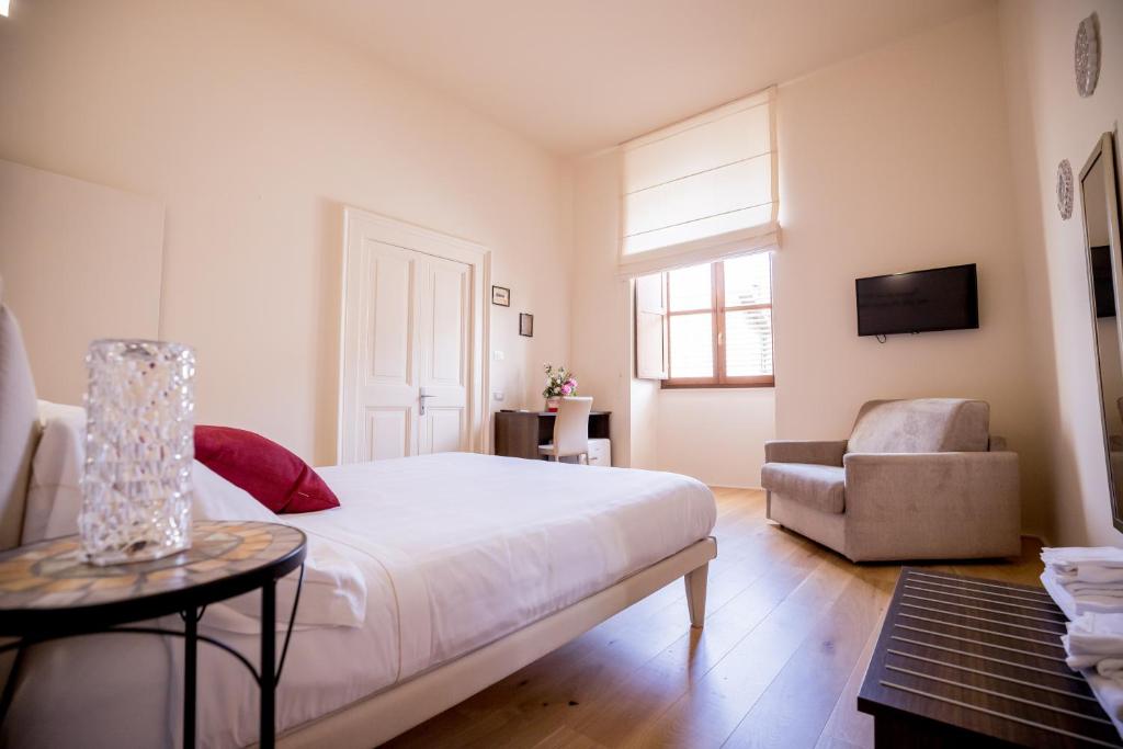 TV a/nebo společenská místnost v ubytování La Torre Rooms