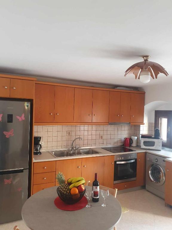 Kuchyň nebo kuchyňský kout v ubytování Aggeliki's House