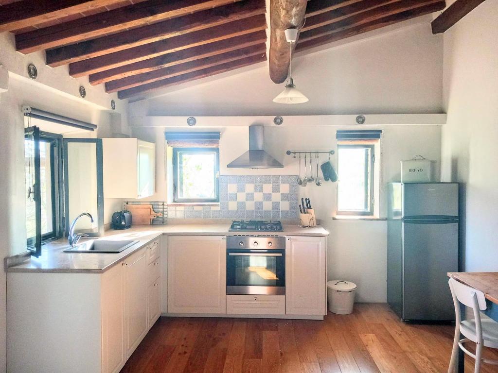 Kuchyň nebo kuchyňský kout v ubytování Agriturismo Timignano