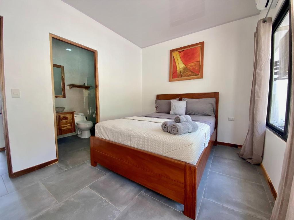 Postel nebo postele na pokoji v ubytování Canavida Villas & Resort