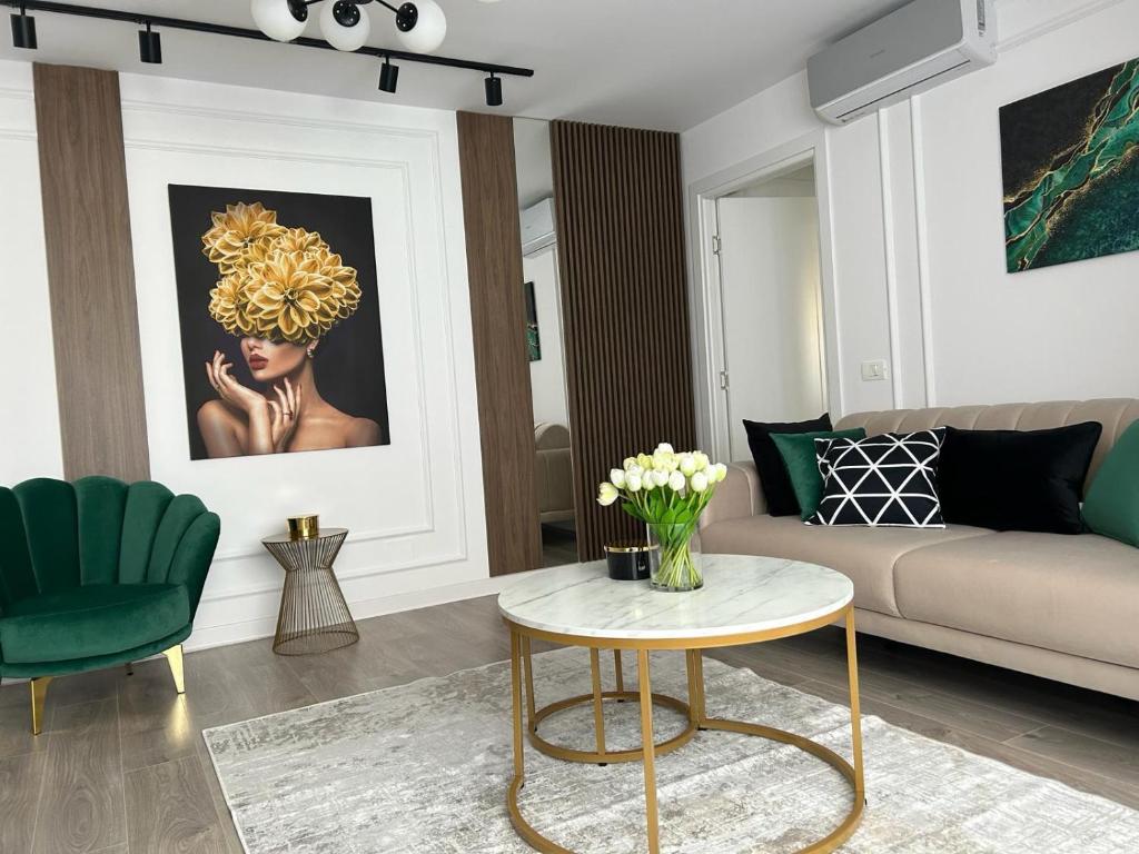 a living room with a couch and a table at LUXURY EST ONE in Drobeta-Turnu Severin