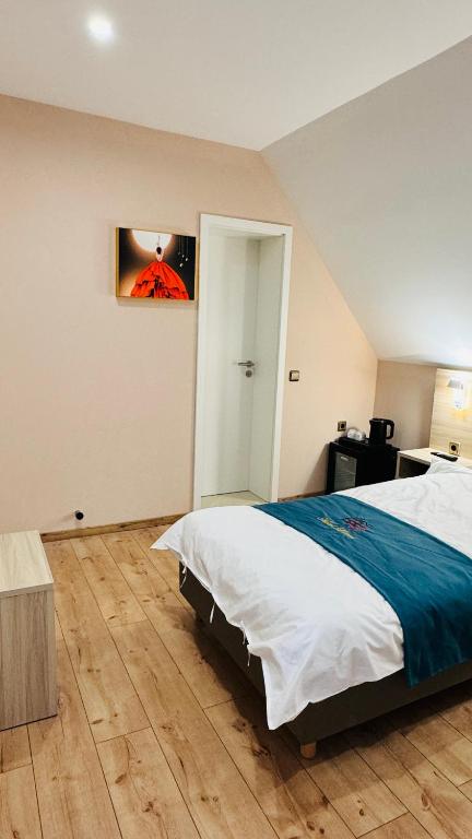 Postel nebo postele na pokoji v ubytování Hotel Libers