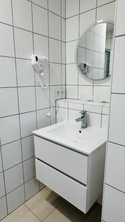 Koupelna v ubytování Hotel Libers
