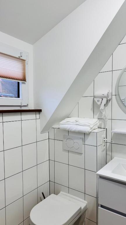 Koupelna v ubytování Hotel Libers