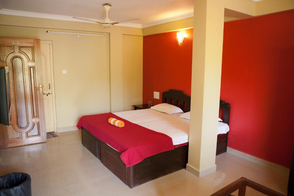 Postel nebo postele na pokoji v ubytování Roundcube Guest House