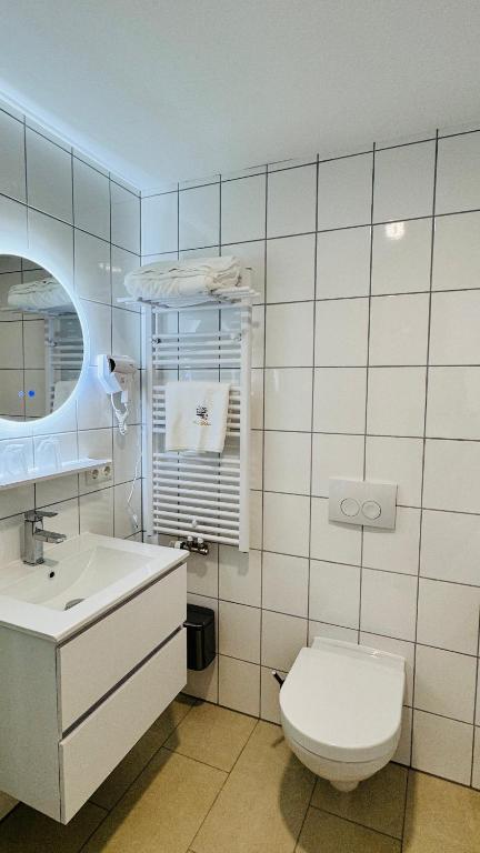Koupelna v ubytování Hotel Libers