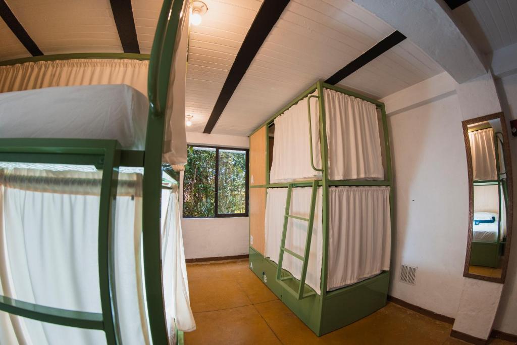 Postel nebo postele na pokoji v ubytování Viajero Salento Hostel
