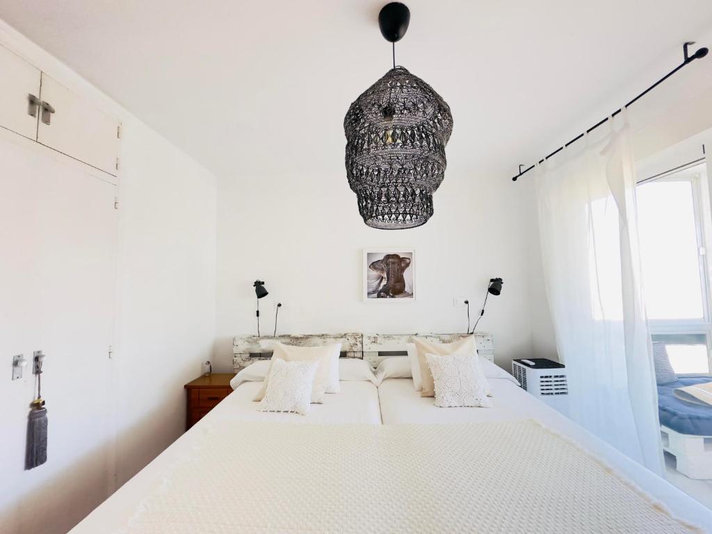 Posteľ alebo postele v izbe v ubytovaní Charming & cosy beach apartment
