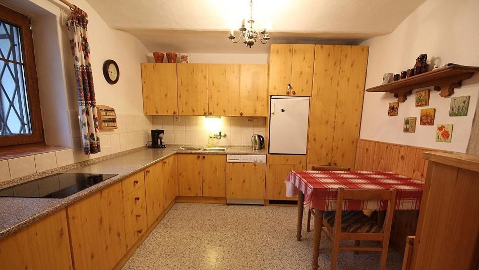 Kuchyň nebo kuchyňský kout v ubytování chata Pohoda, chata Kvítek, chata Western