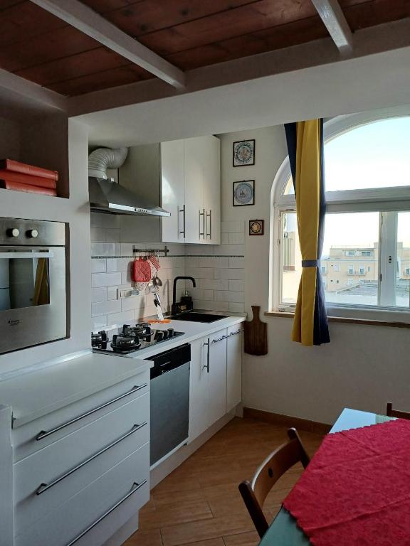 Kuchyň nebo kuchyňský kout v ubytování B&b Adele