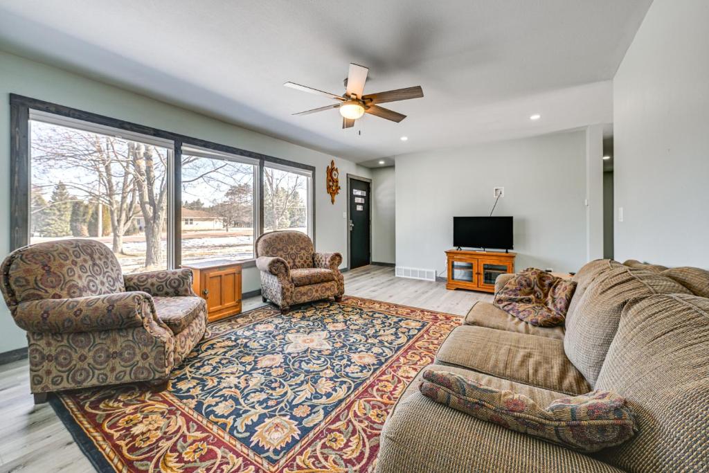 a living room with a couch and two chairs at Wausau Home with Yard 1 Mi to Granite Peak Ski Area in Wausau