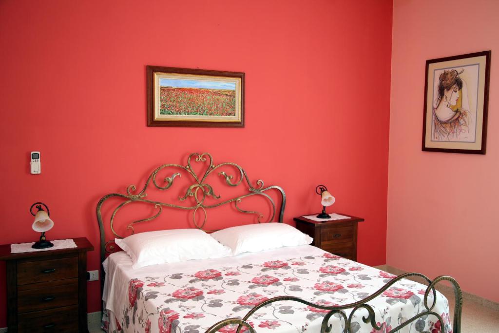 Postel nebo postele na pokoji v ubytování B&B Borgosolare