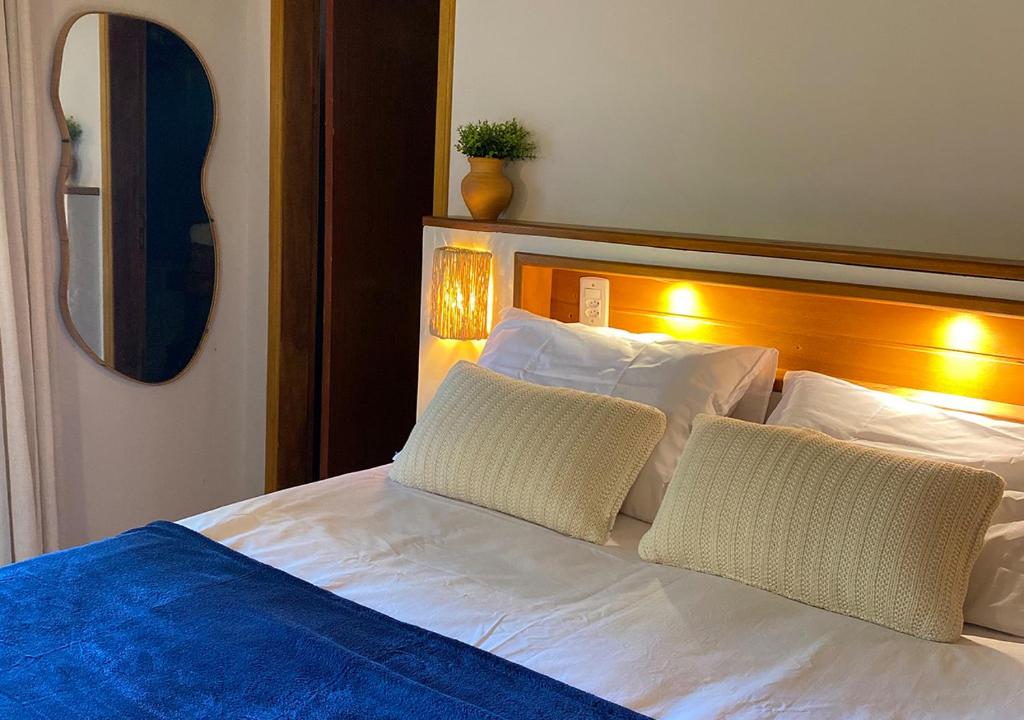 Postel nebo postele na pokoji v ubytování Bella Mar Atins Chalet