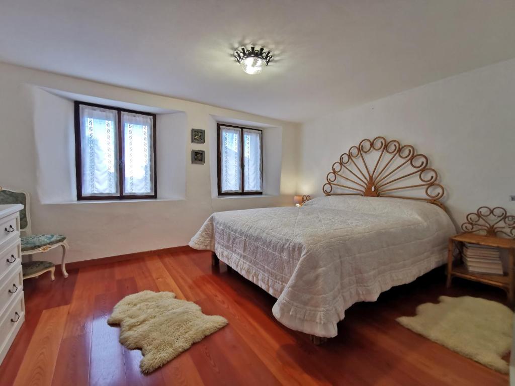 Postel nebo postele na pokoji v ubytování La casa nel borgo