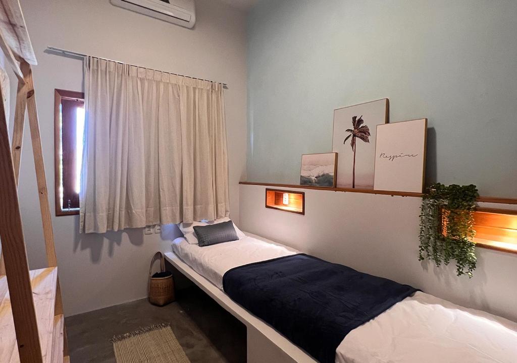Postel nebo postele na pokoji v ubytování Bella Mar Atins Chalet