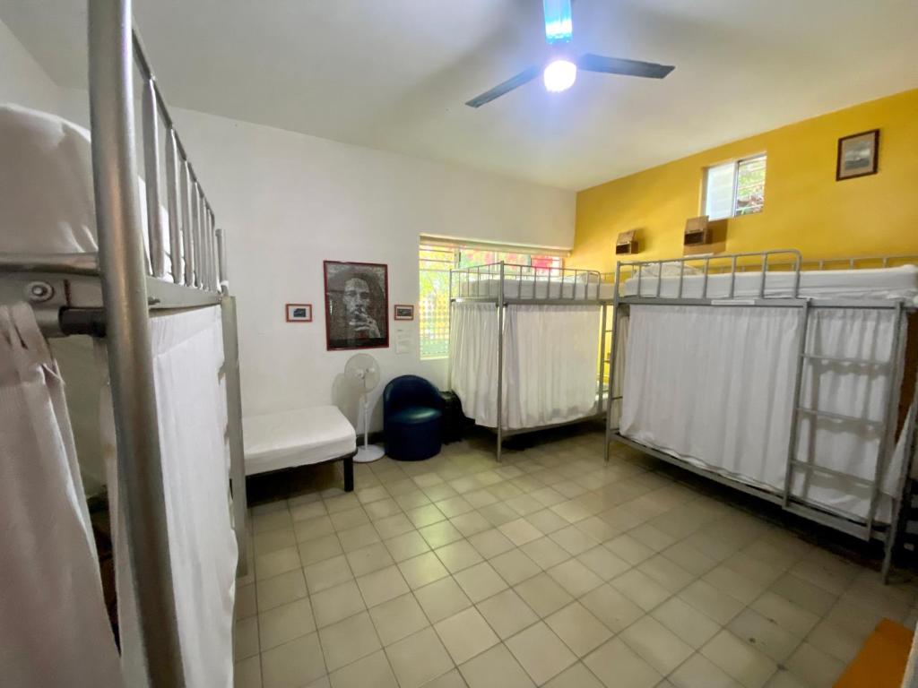 Postel nebo postele na pokoji v ubytování Hostel Hospedarte Chapultepec