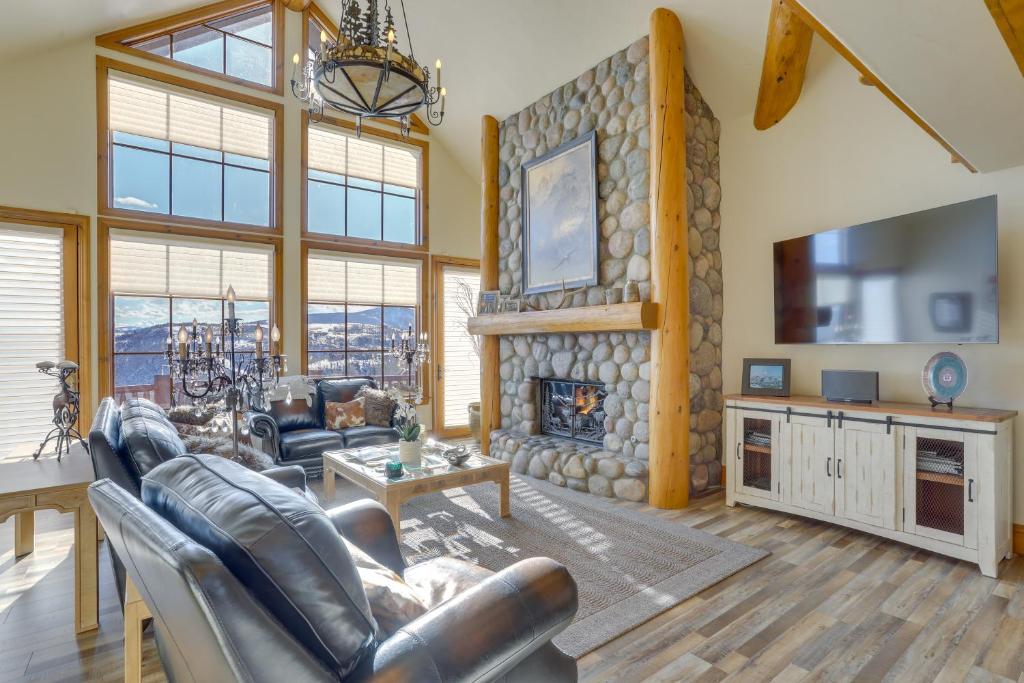 a living room with a couch and a fireplace at Edwards Home in Cordillera Hot Tub, Mountain View in Edwards