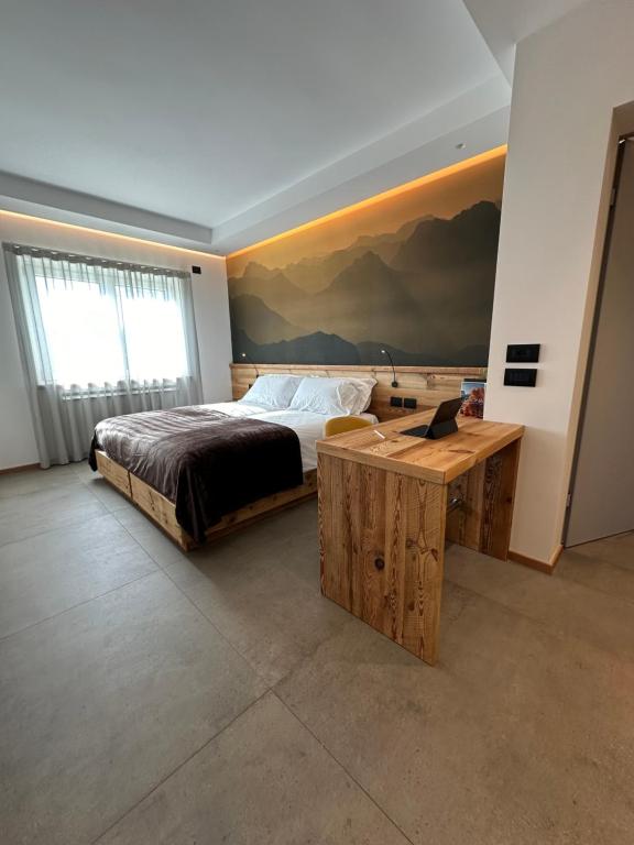 Postel nebo postele na pokoji v ubytování Origini Holidays