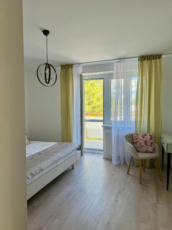 Postel nebo postele na pokoji v ubytování Apartment ZOi