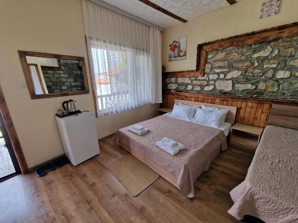 Postel nebo postele na pokoji v ubytování Hotel My House