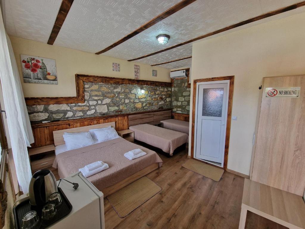Postel nebo postele na pokoji v ubytování Hotel My House