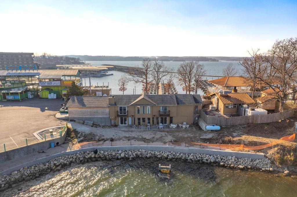 an aerial view of a house on the water at Lazy Gator House- Sleep 20- Bachelor Parties Welcome in Lake Ozark