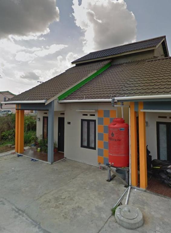 Sintia House في Sungaidurian: يتم بناء منزل به
