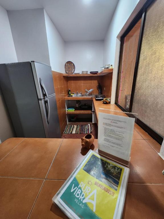 Kuchyň nebo kuchyňský kout v ubytování Villas Pura Vibra