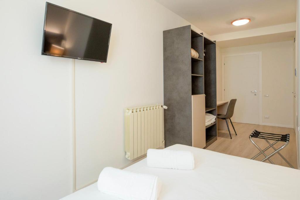 TV a/nebo společenská místnost v ubytování Hotel dell'Angelo