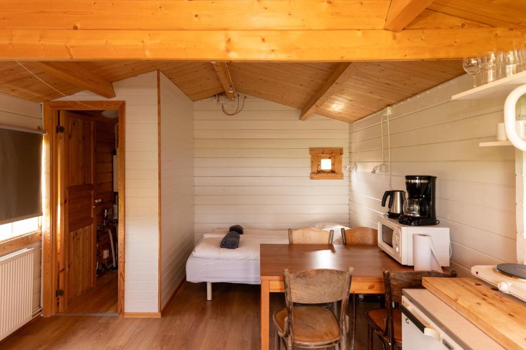 Kuchyň nebo kuchyňský kout v ubytování Gladheimar Cottages